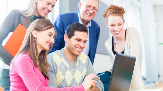 College students lerning with professor