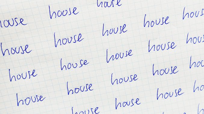 A paper with the word "house" written several times on it to provoke a vuja de