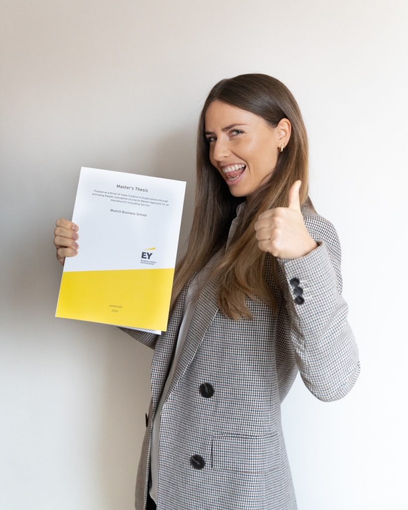 Julia Kraft with her master's thesis