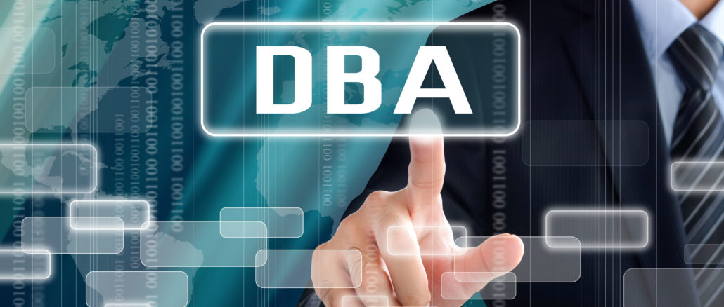 Businessman touching a sign with DBA lettering