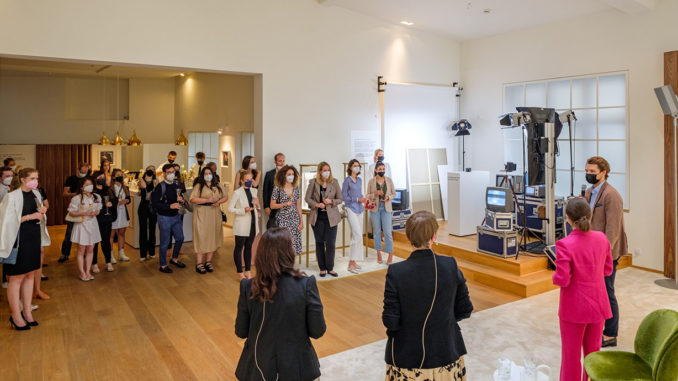 Students and alumni of Munich Business School at the Cartier TANK exhibition in Munich.