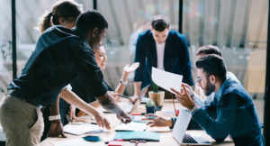 A diverse group of professionals working together on a project