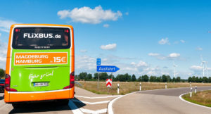 A FlixBus bus on the road, seen from behind