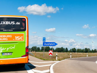 A FlixBus bus on the road, seen from behind