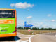 A FlixBus bus on the road, seen from behind