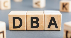 DBA - acronym from wooden blocks with letters