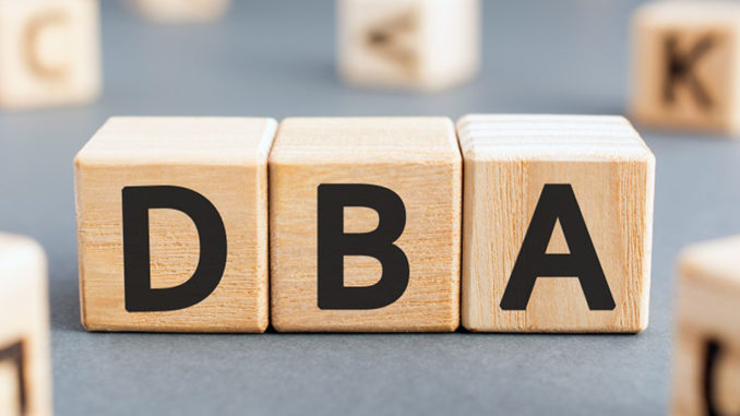 DBA - acronym from wooden blocks with letters