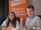 Anna Bettu and Christian Klemenz, student and alumnus of Munich Business School, sitting next to each other during the internshp at Bierothek