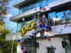 Façade of Munich Business School decorated with balloons for the semester opening