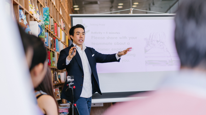 Munich Business School: DBA Teaching Doctorate teaches in front of a group of adults