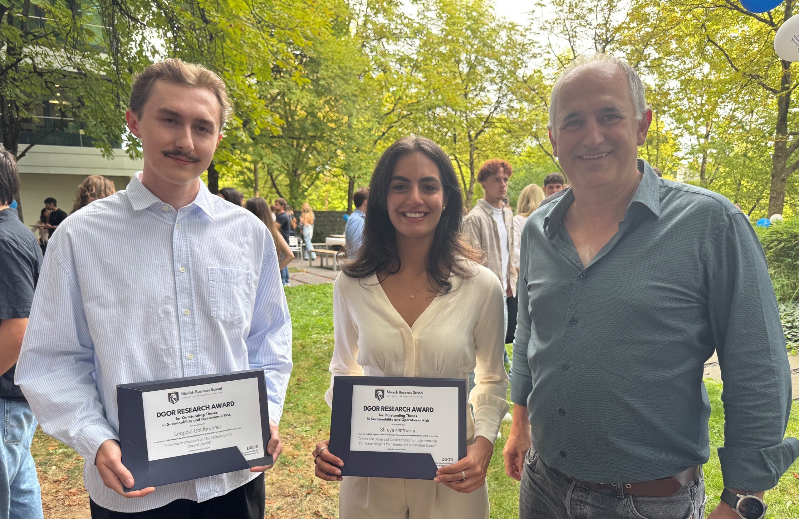 https://www.munich-business-school.de/insights/wp-content/uploads/2026/09/DGOR-mit-Johannes-Leopold-und-Shreya-2026-scaled.jpg
